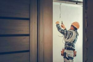 Electrician Cutting Wires photo