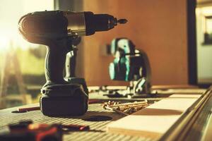 Woodworking Power Tools on a Table Inside the Workshop photo