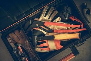 Contractor Toolbox with Tools, Gloves and Glasses photo