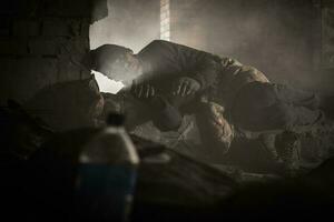 Homeless Men Sleeping Inside House Ruins photo