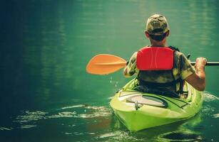 Kayaker on the Calm Water photo