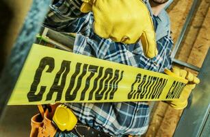 Caution Construction Tape Closeup photo