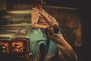 Cowboy and His Classic Vintage Car photo