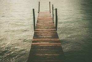 Rustic Wooden Pier on the Lake photo