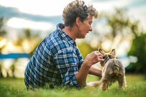 Woman Playing with Dog photo