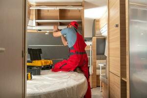 Caucasian RV Campers Technician at Work photo