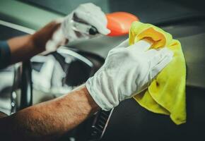 Cleaning and Sanitizing Car Interior and Dashboard photo