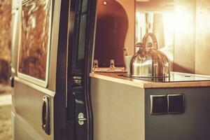 Water Kettle Inside Modern Camper Van photo