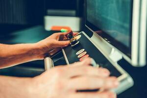 Digitally Operated Laser Cutter Console Operated by Caucasian Worker photo