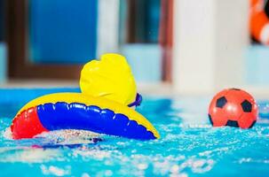 Kid Playing in the Pool photo