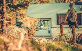 Tourist in Front of His Camper Van RV Motorhome photo