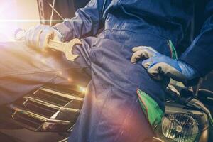 Mechanic with Wrench in Hand photo