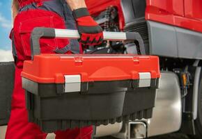 Pro Technician with Tools Box in His Hand Preparing For His Job photo