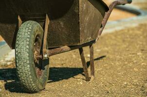 Aged Metal Wheelbarrow photo