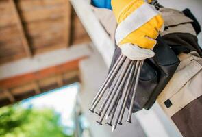 Worker with Huge Nails photo