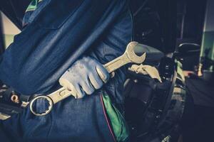 Car Mechanic with Wrench photo