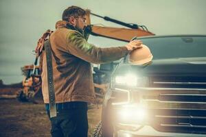 Ground Works Contractor Worker Next to His Pickup Truck photo