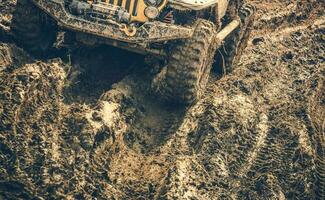 Four Wheeler On Rough Muddy Country Road. photo