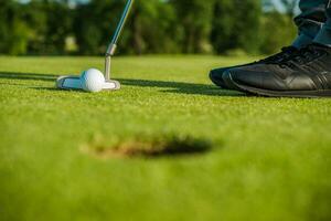 Golf Player Ready to Make Final Stroke photo