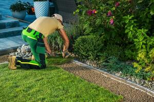 Landscaper Cut Natural Grass Turfs to Size photo