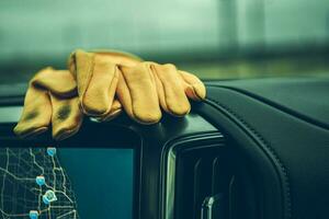 Workers Gloves on Pickup Truck Dashboard photo