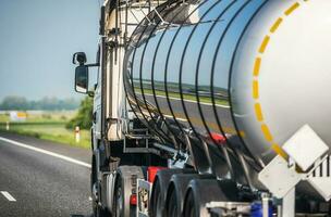 Tank Trailer Semi Truck on a Highway photo