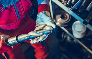 Metalworking Technician with Large Drill Bit in His Hands photo