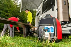 Gasoline Powered Generator Running Next to Camper Van RV photo