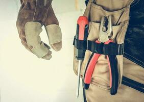 Pliers and Screwdriver in Handyman Tools Pocket photo