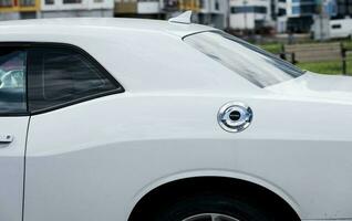 Minsk, Belarus, May 2023 - fuel tank of a white dodge car photo