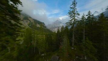 FPV maneuverable flight near the lake Oeschinensee in Swiss Alps, Switzerland. video