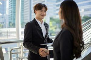 Businessman shaking hands together. Team success concept. photo