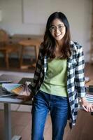 Portrait of female graphic designer in office. photo