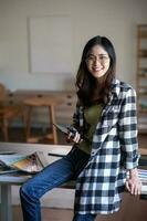 Portrait of female graphic designer in office. photo