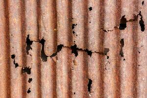 Corrosion and rust on zinc sheet background and texture. photo