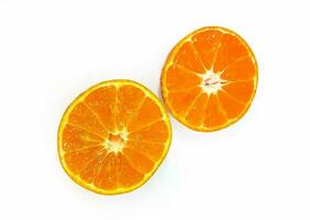 Two half piece slice of fresh orange isolated on white background with clipping path. Freshness fruit. Tropical, Summer and healthy food concept photo