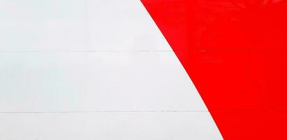 White and red stainless steel panel for background or wallpaper. Art of line and colorful. photo