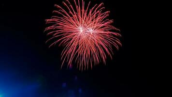 fireworks celebration over the temple in the dark sky photo