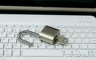 Computer concept Network Security Lock system entry key and chain. photo