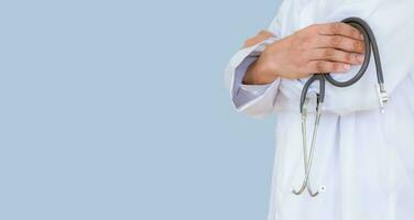 A doctor with a stethoscope in the hospital photo