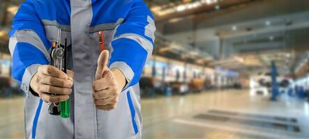 Auto mechanic in the auto service center car photo