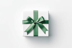 Gift box with satin ribbon and bow on white background photo