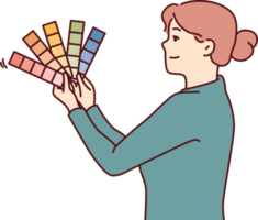 kvinna är innehav palett av färger och nyanser medan med tanke på dekoration av ny lägenhet png