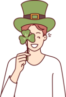Man with St Patrick Day celebration accessories wearing green hat and covering eye with clover petal png