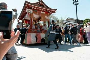 TOKYO, JAPAN - APRIL 9, 2023 White heron dance parade in Sensoji temple photo