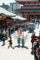 TOKYO, JAPAN - APRIL 9, 2023 White heron dance parade in Sensoji temple photo