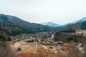 SHIRAKAWA, JAPAN - APRIL 5, 2023 Aerial view of Shirakawa-go village in springtime photo