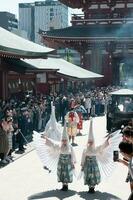 TOKYO, JAPAN - APRIL 9, 2023 White heron dance parade in Sensoji temple photo