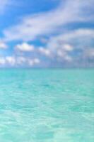 Abstract blur light on sea and ocean background for summer season. Peaceful nature environment. Blurred blue background and blue sky and bokeh sea photo