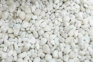 White pebbles stone texture and background. Natural pattern photo